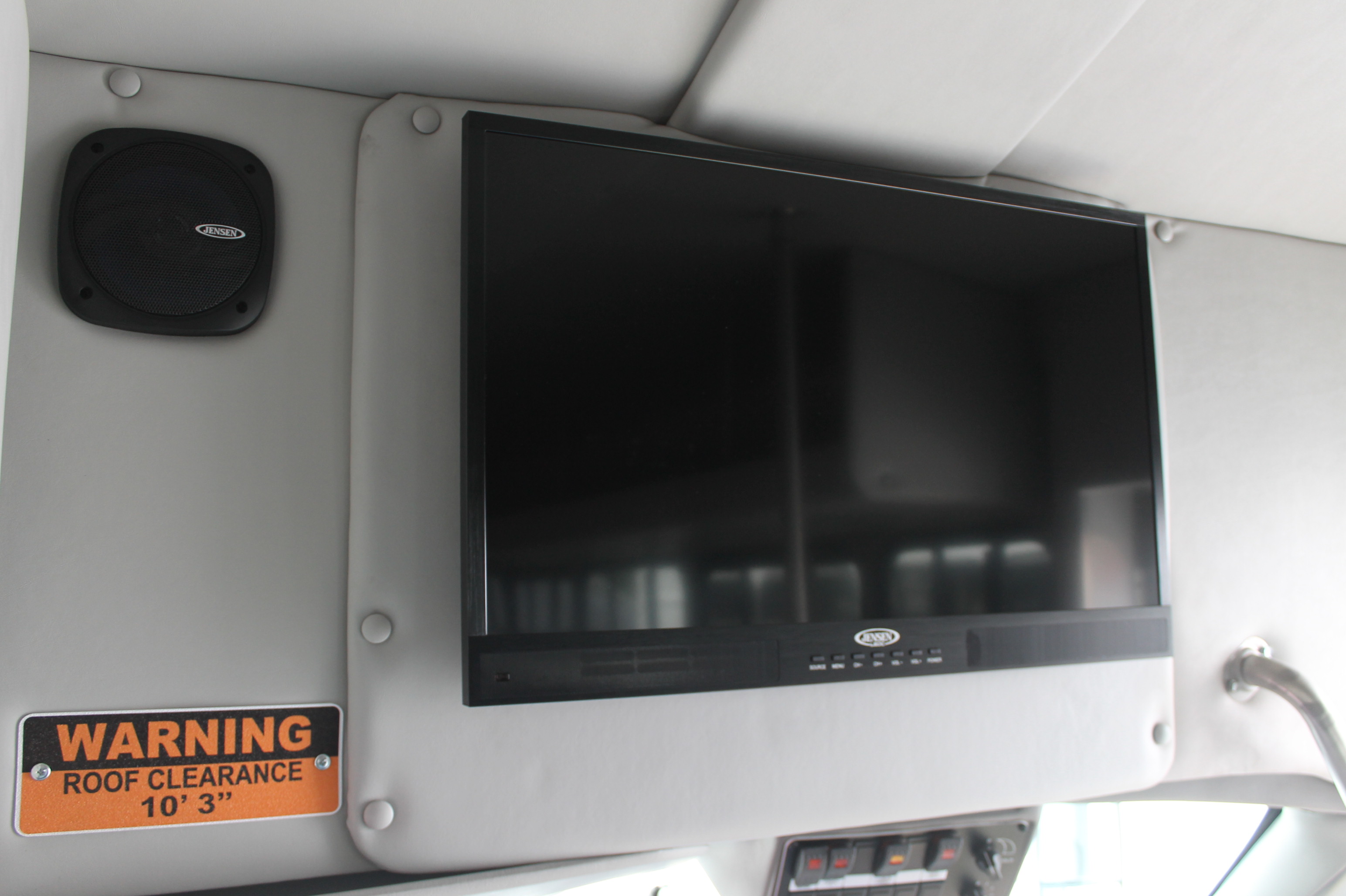 TV inside 24 passenger minibus rental